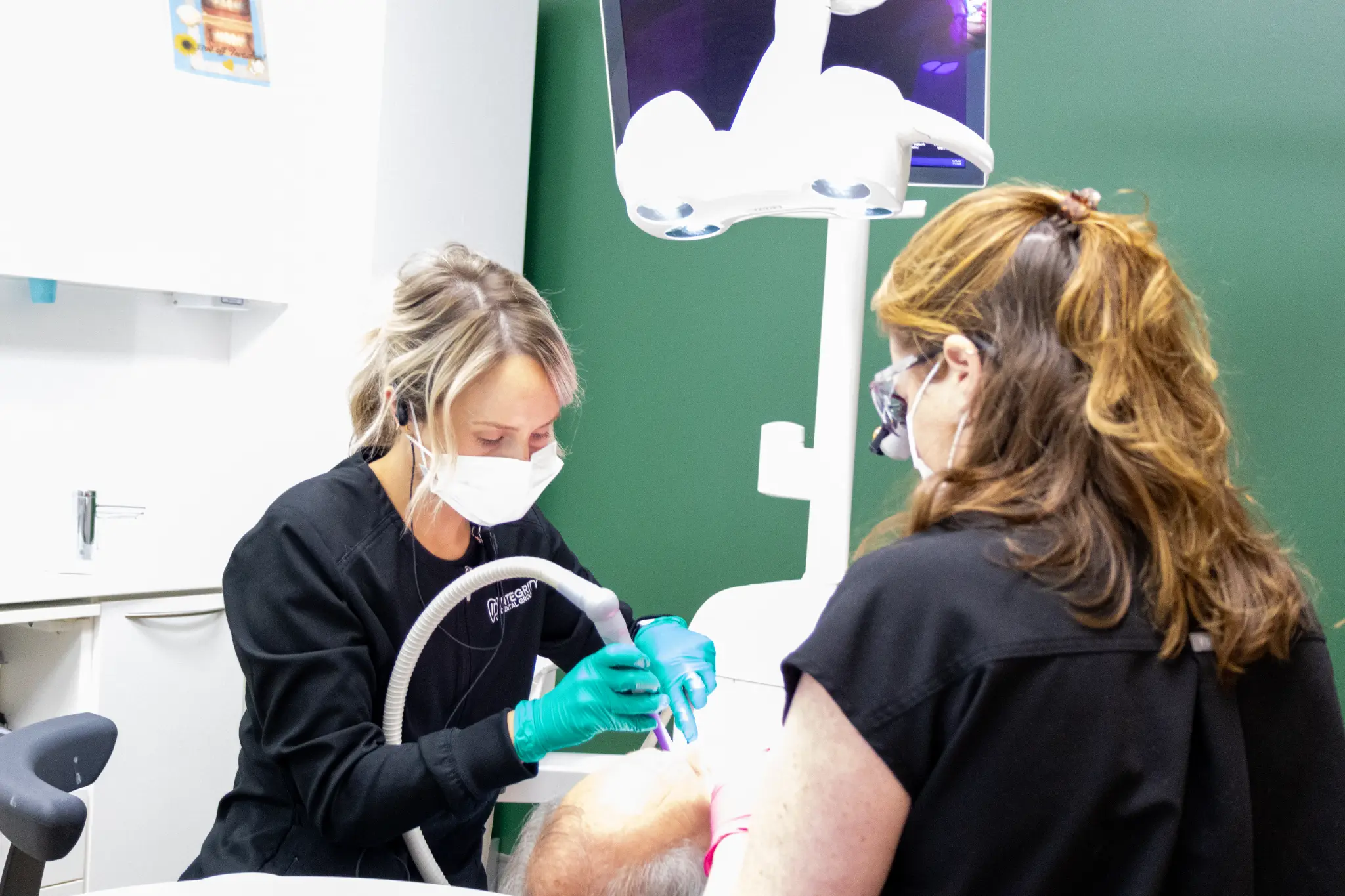 Dr. Allin with a patient